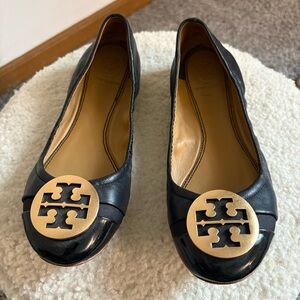Tory Burch Black Flats with Gold Emblem